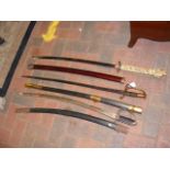 Three reproduction swords
