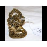 A small gilt bronze oriental Buddha statue - 7.5cm