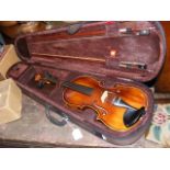 A Stentor 3/4 size violin with two bows and case