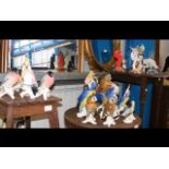 A flock of German Karl ENS porcelain birds in the