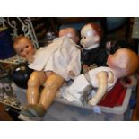 A collection of vintage dolls, celluloid and bisqu