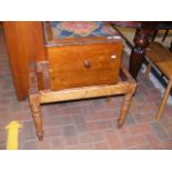 A mahogany luggage rack together with a bidet