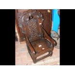 A miniature carved period oak Wainscot style chair