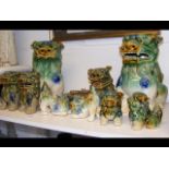 A collection of ceramics Dogs of Fo in green and b