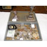 A silver candlestick, coinage, etc.