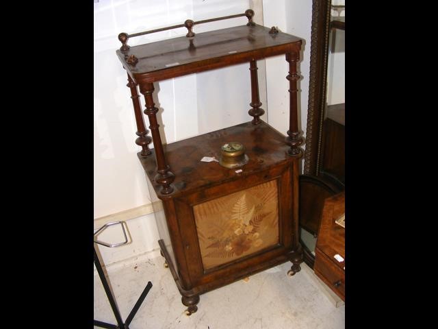 A Victorian walnut whatnot with cupboard below