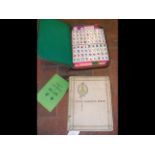 A composition Mahjong set in case together with a