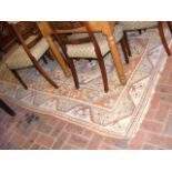 An antique rug with geometric border - 240cm x 160
