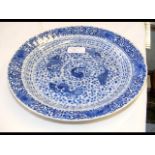 A Kanxi blue and white dish, decorated with carp -