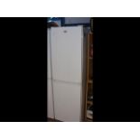 A Beko upright fridge/freezer in white