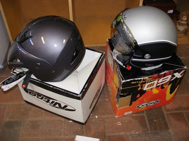 A Nexx motorbike helmet together with one other