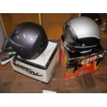 A Nexx motorbike helmet together with one other