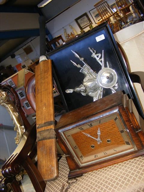 A vintage cricket bat, oak cased clock together wi