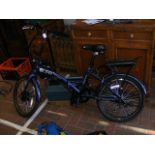 An Elife regency electric bicycle in blue, togethe