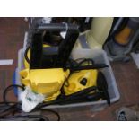 A Karcher pressure washer and tools
