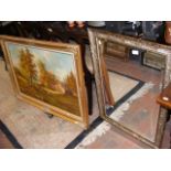 A gilt framed oil painting of barn in forest toget