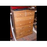 A modern pine chest of drawers