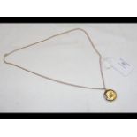 A 9ct gold locket on gold chain