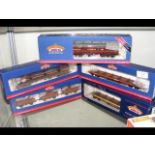 A boxed Bachmann bolster wagon, together with four