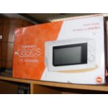 A Sainsbury's microwave in white