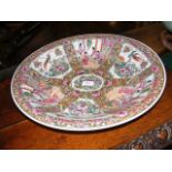 A 48cm diameter Famille Rose charger with foliate,