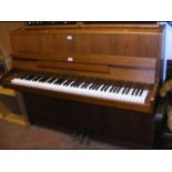 A Zimmerman upright piano in light wood case - 3 p