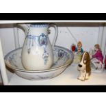 A Szeiler figure of a dog, floral pattern jug and