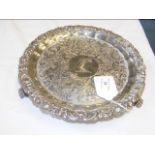 A 21cm diameter silver waiter's tray with engraved