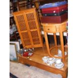 A hardwood circular occasional table with drawer u