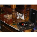 A 1920s picnic gramophone together with a quantity of 78rpm shellac records in suitcase