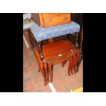 A nest of three occasional tables