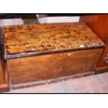 An antique pine blanket box