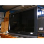 A Sony Bravia 31 inch flatscreen TV, with remote