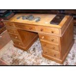 An old pine pedestal desk