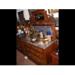 An Edwardian washstand with marble top and splash