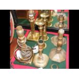 Selection of brass candlesticks, table lamps