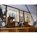 A collection of five mantel and bedside clocks, in