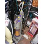 A Dyson DC04 upright vacuum cleaner
