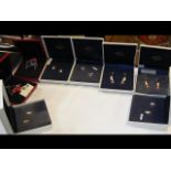 Eight hand painted jewellery suites - boxed