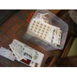 A large plastic box of collectable stamps - sheets