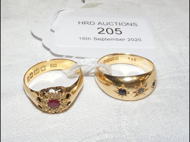 A ruby and diamond ring in 22ct gold setting, toge