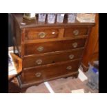 A country oak chest of two short and three long gr