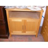 An oak effect side cabinet with cupboards under - width 76c