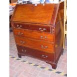 A Georgian mahogany bureau with fitted interior an