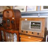 Two vintage walnut cased mains radios including an