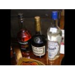 A Grant's Dry Gin together with Hennesey Cognac an