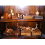 Two shelves of treen, including miniature chest