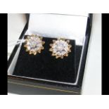 A pair of 18ct gold diamond cluster 'Daisy' earrin