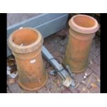 Two terracotta chimney pots