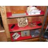Various collectables, including military badges, s